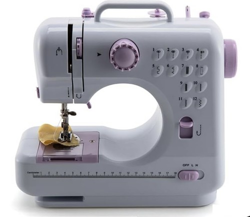 Macchina cucire portatile - cucire,